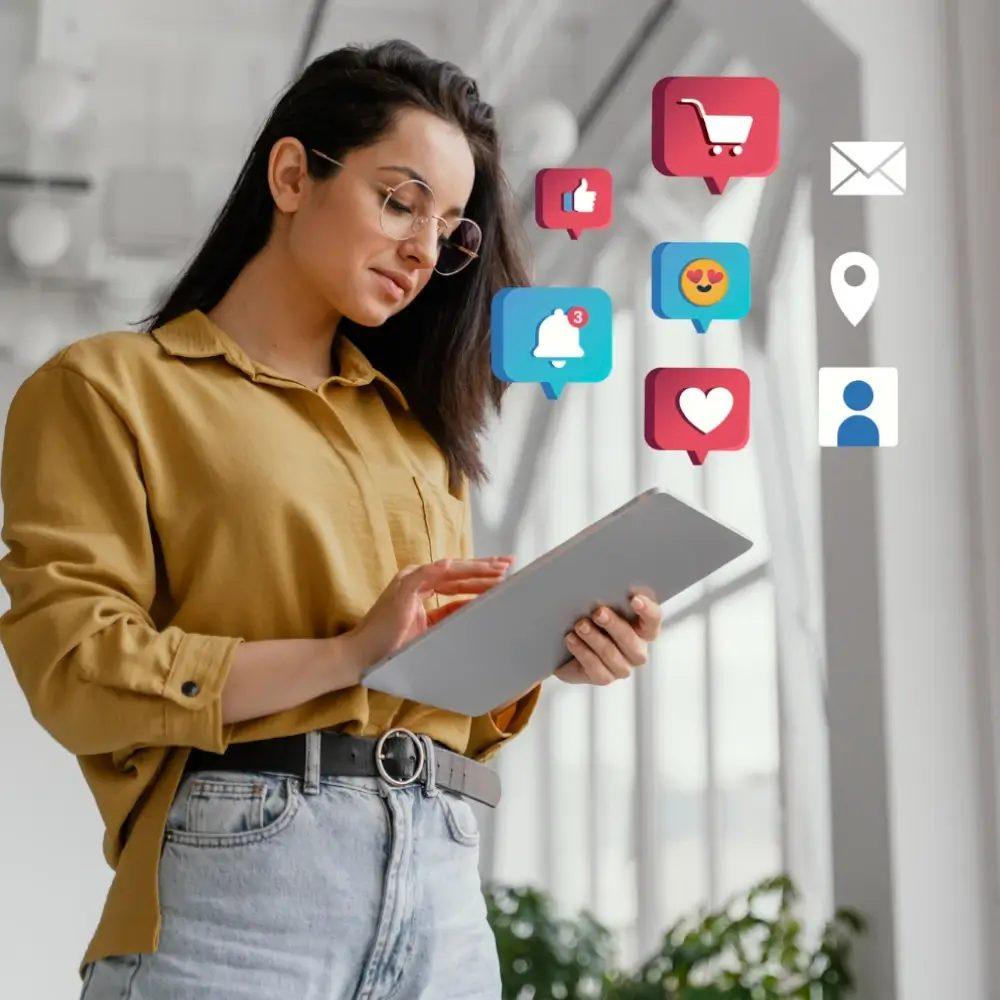 Woman managing social media campaigns on a tablet
